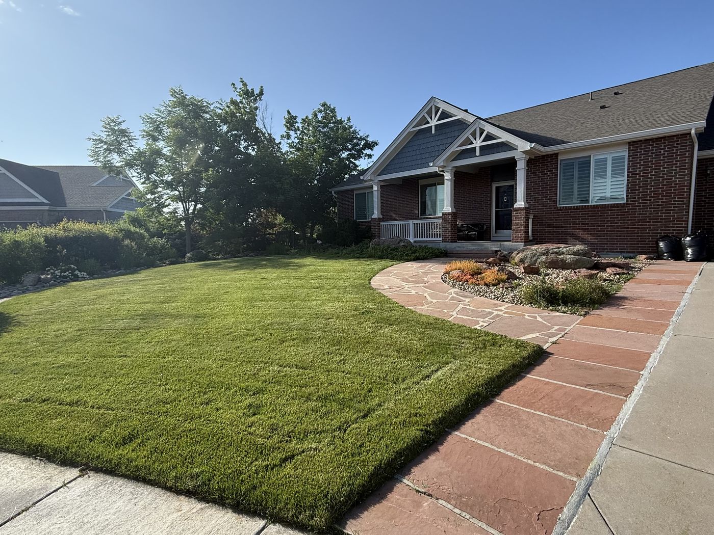Front yard with healthy green lawn and clean edging